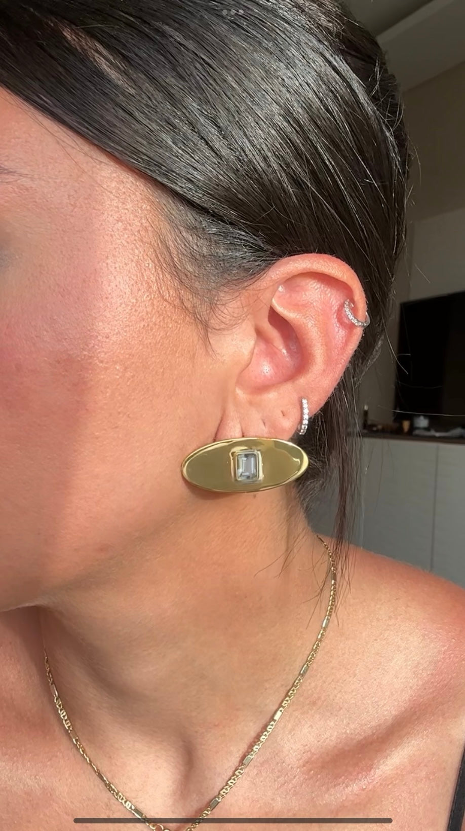 Gold oval stud earring with green amethyst octagon gemstone